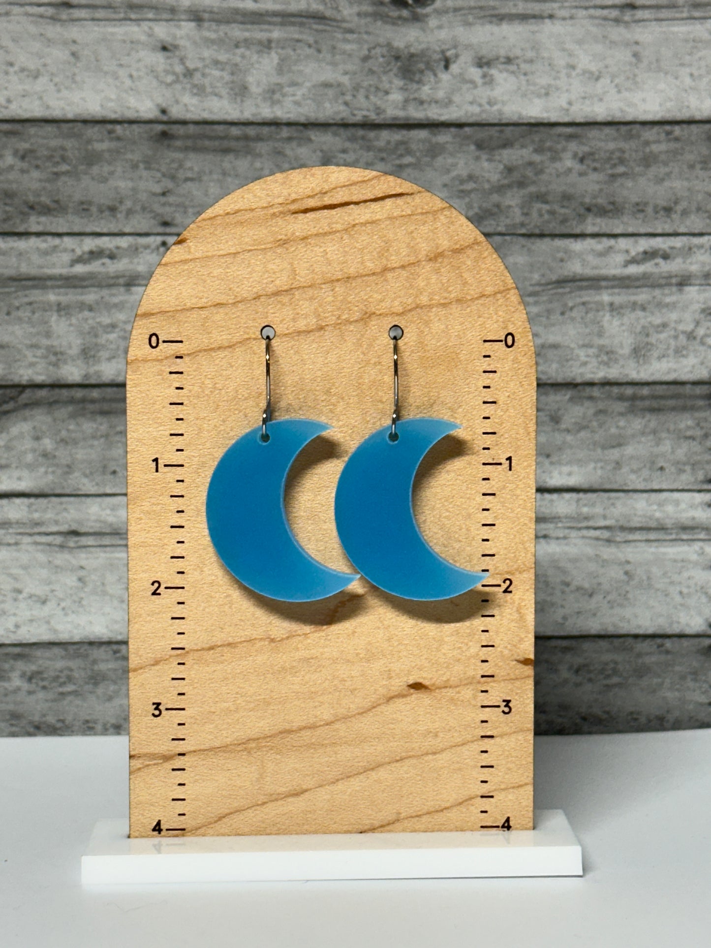 Blue Glow in the Dark Crescent Dangle Earrings