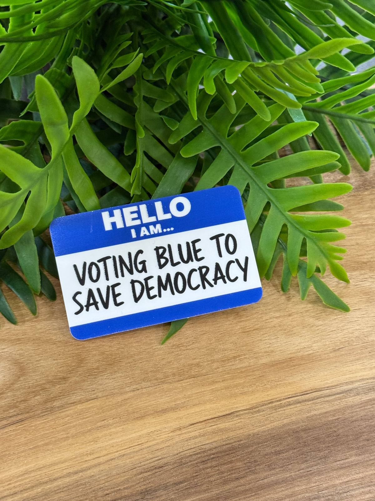 Blue-and-white name-tag-style acrylic magnet reading Hello I am... Voting Blue to Save Democracy
