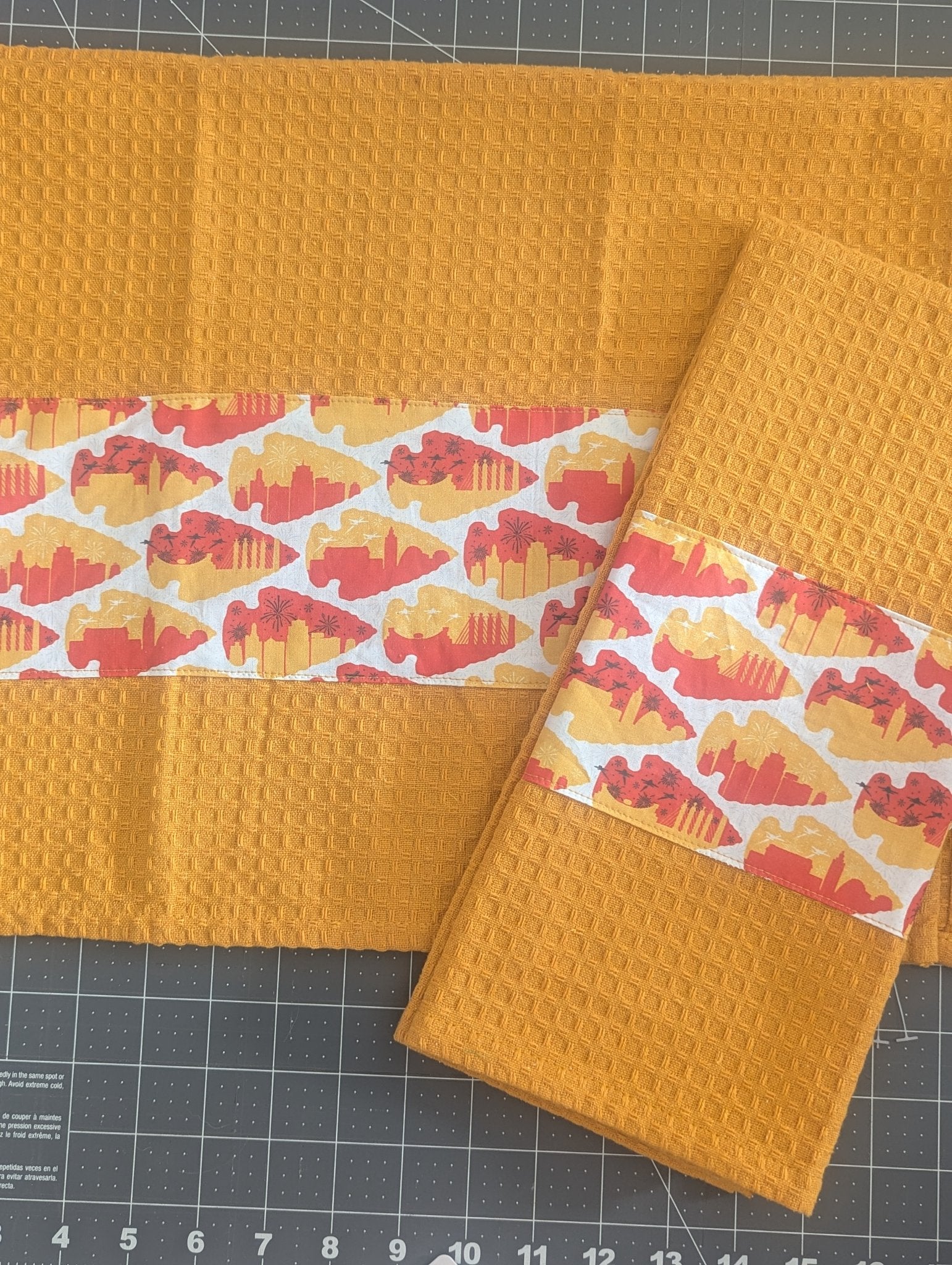 6962d7ad3c88180e99189941_arrowhead-skyline-gold-towel_1769709264103.jpg