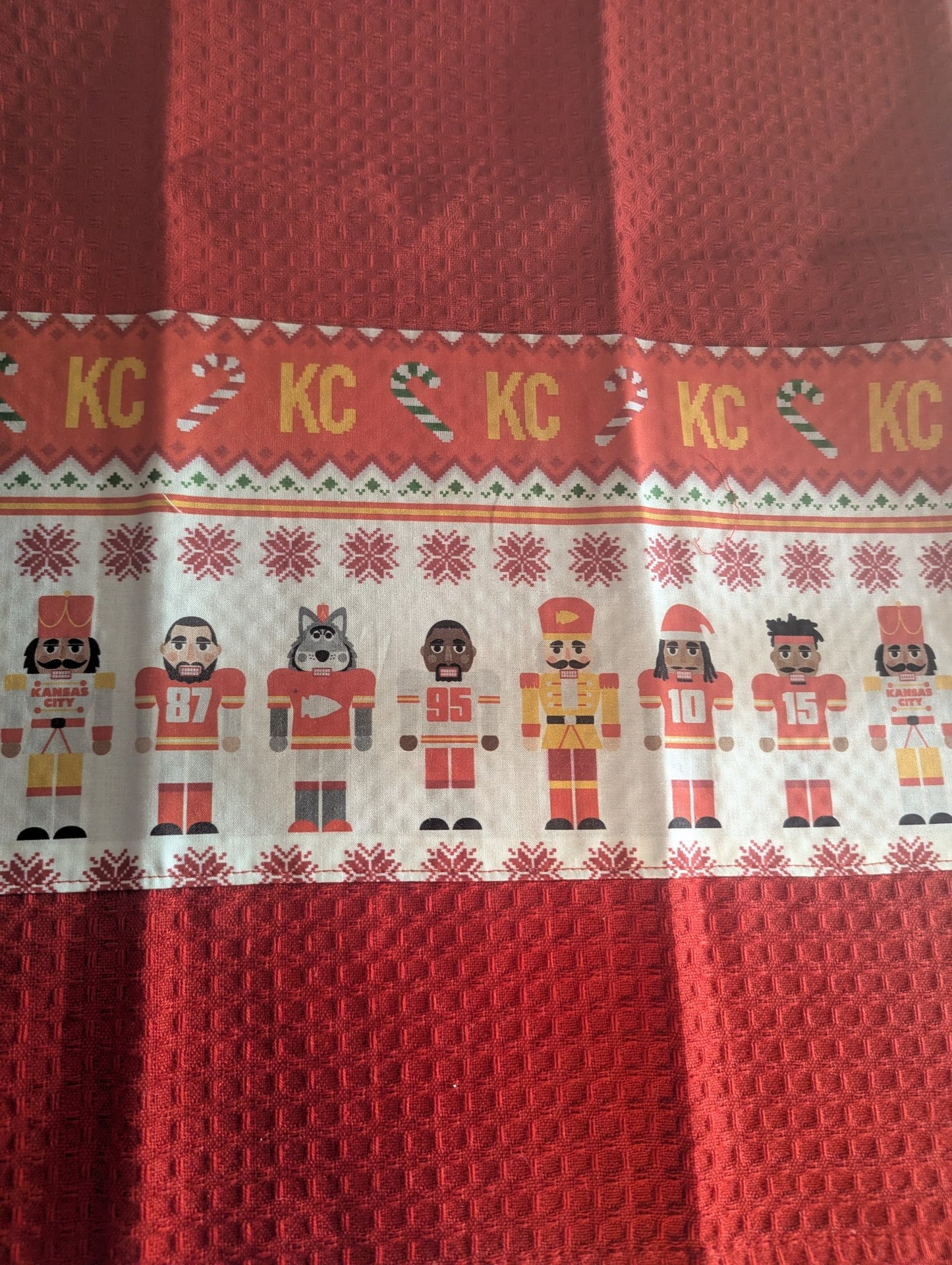 6962d7ad3c88180e99189941_kc-chiefs-nutcracker-towel-large_1787260152019.jpg
