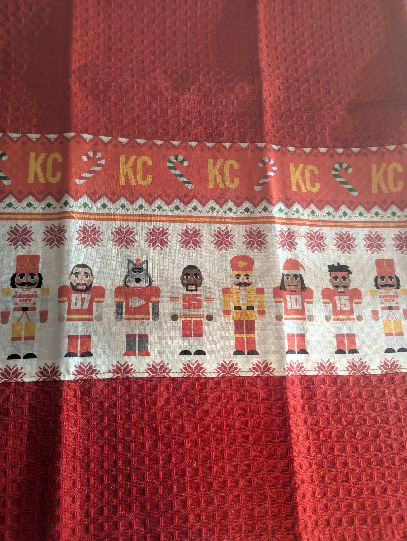 6962d7ad3c88180e99189941_kc-chiefs-nutcracker-towel-large_1787260152019.jpg
