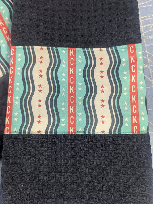 6962d7ad3c88180e99189941_towel-kc-current-squiggles-navy-close_1769475874555.jpg