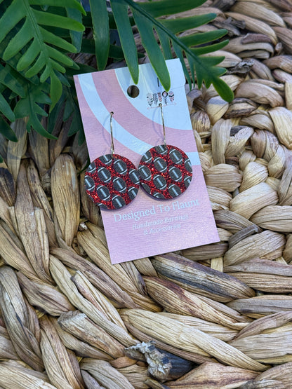 Football Scattered Print Dangle Earrings on Red Glitter