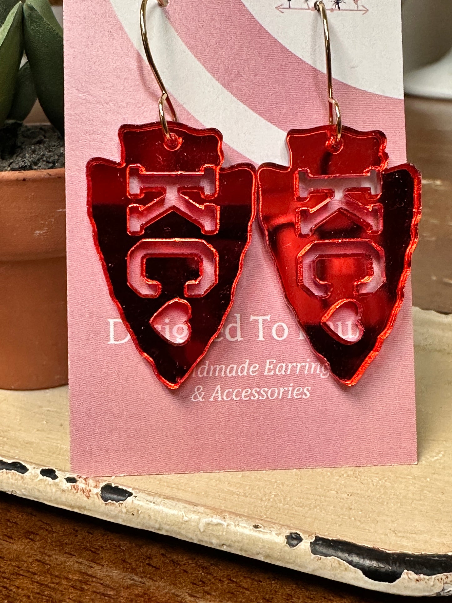 KC Heart Cutout Dangle Earrings