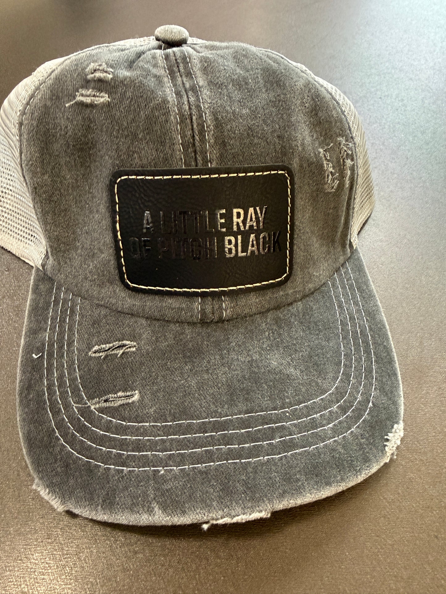 A Little Ray of Pitch Black Women's Ponytail Hat