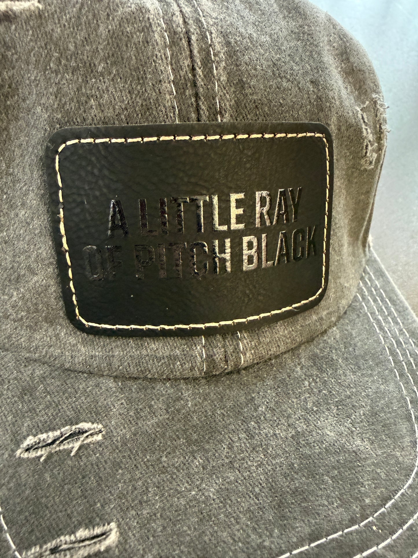 A Little Ray of Pitch Black Women's Ponytail Hat