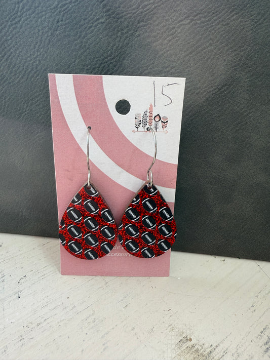 Football Scattered Print Dangle Earrings on Red Glitter