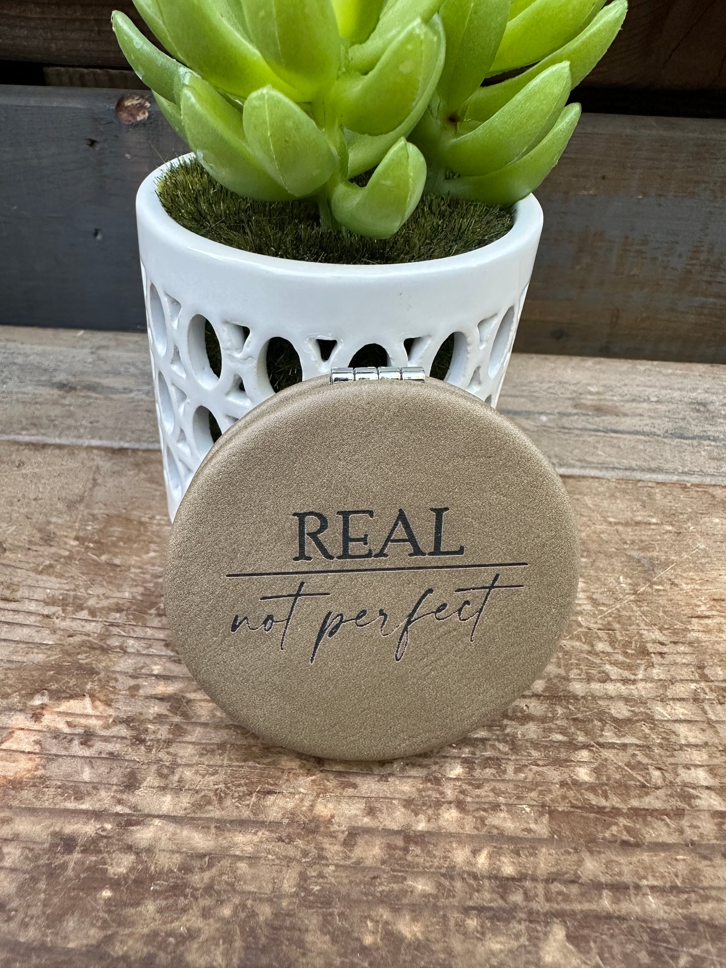 Real Not Perfect Compact Mirror
