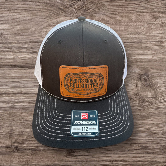 Engraved Professional Bullshitter Men's Richardson 112 Trucker Hat