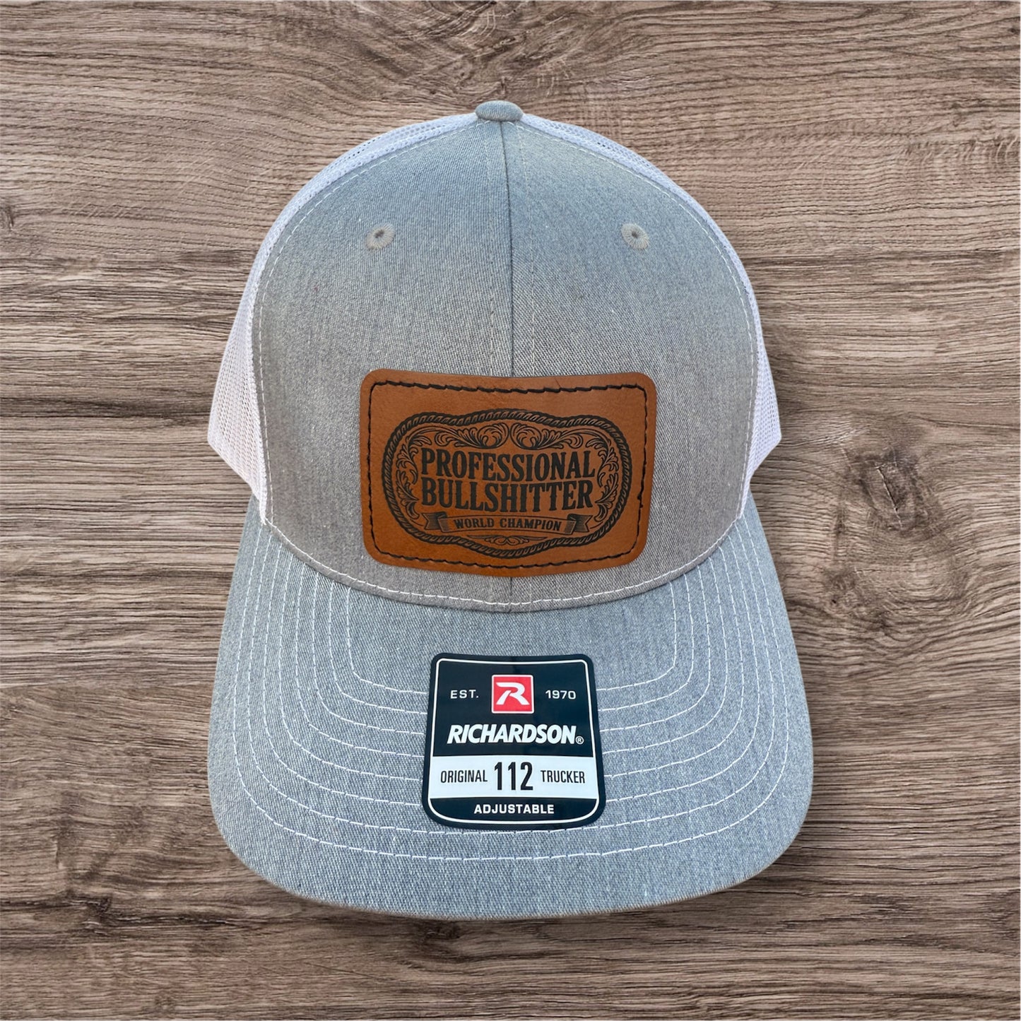 Engraved Professional Bullshitter Men's Richardson 112 Trucker Hat