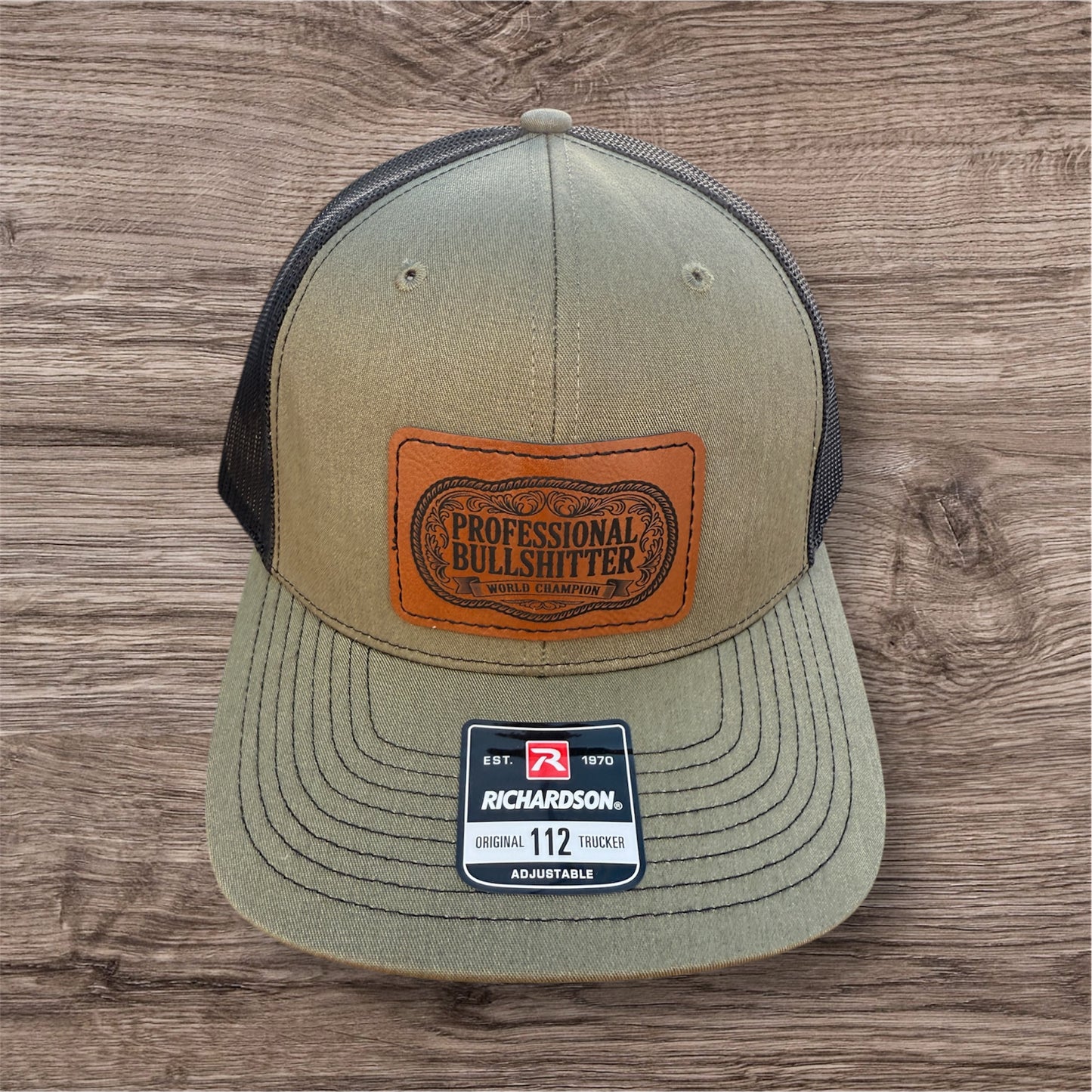 Engraved Professional Bullshitter Men's Richardson 112 Trucker Hat