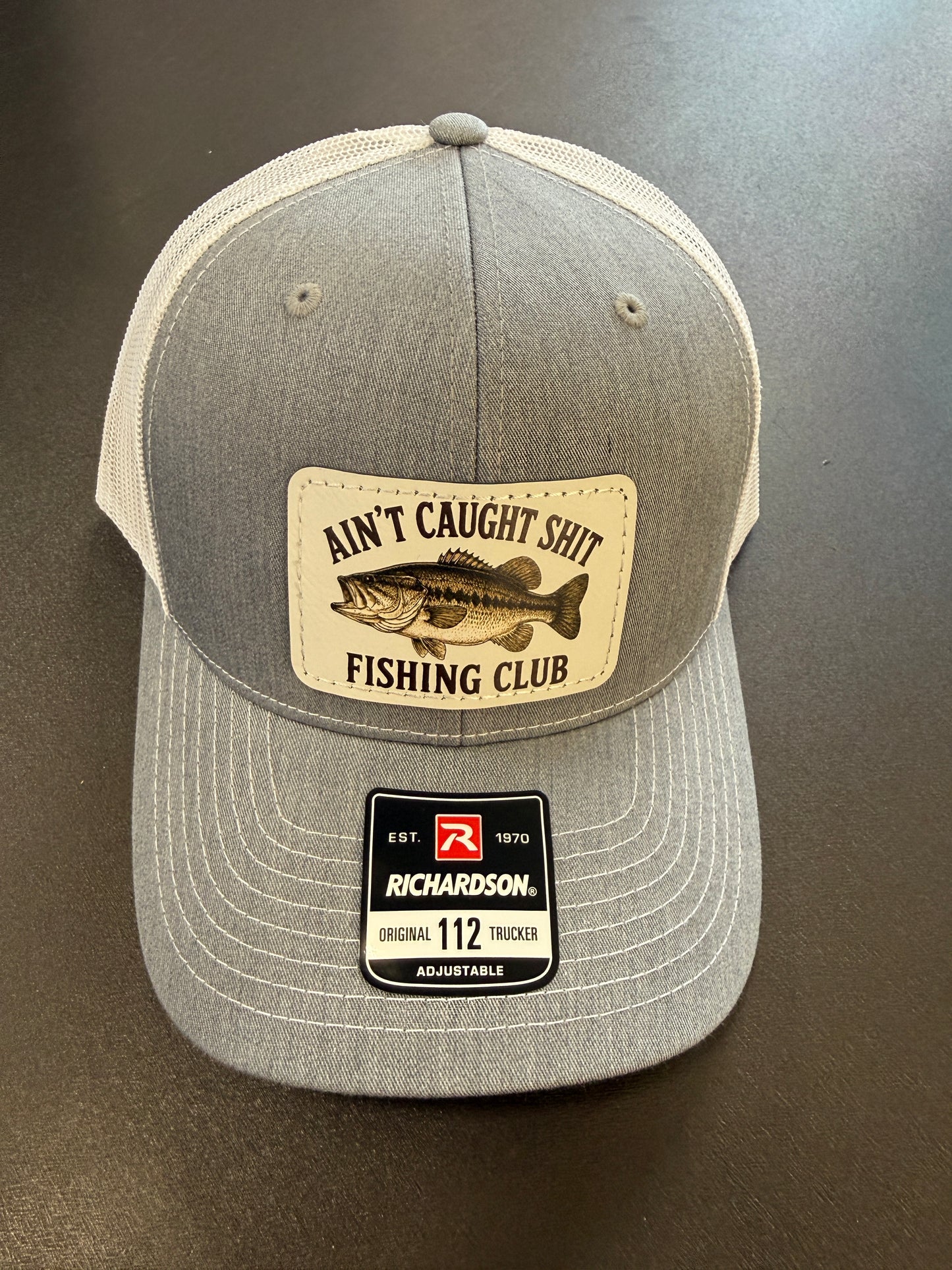 UV Printed Ain't Caught Shit Fishing Club Richardson 112 Men's Hat
