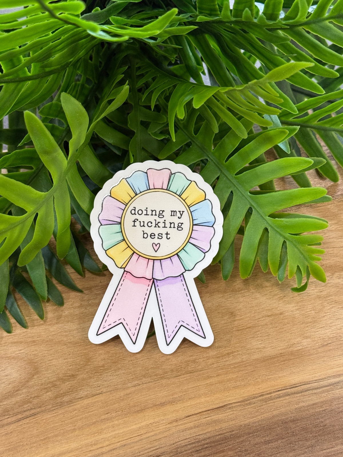 Pastel award-ribbon acrylic magnet reading doing my fucking best with a small heart and pink and lavender ribbon tails
