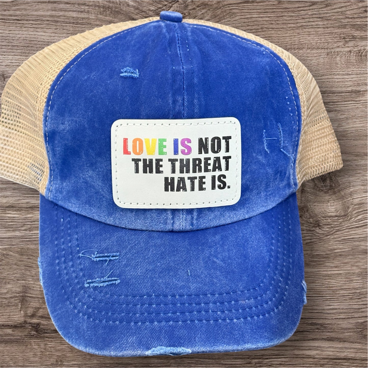 Love Is Not The Threat Pride Women's Ponytail Hat